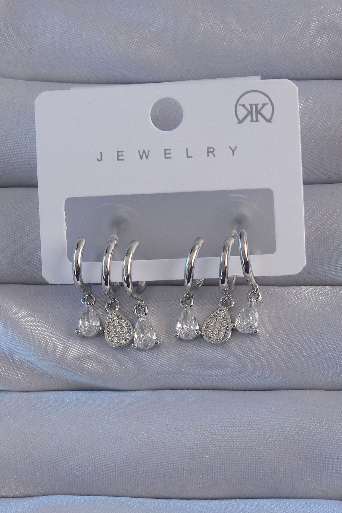 YRTCL Pirinç Gümüş Renk Zirkon Taşlı Damla Model Çoklu Görünüm Yarım Halka Küpe