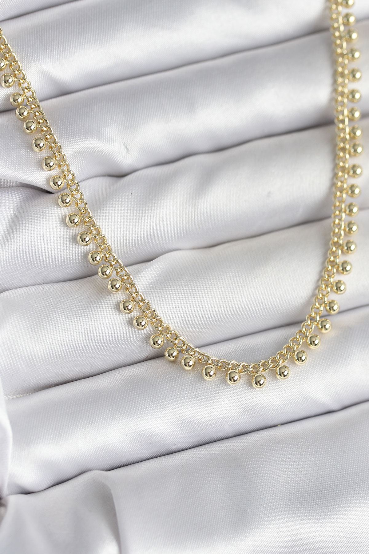 YRTCL Pirinç Gold Renk Sıralı Topçuk Model Kadın Kolye