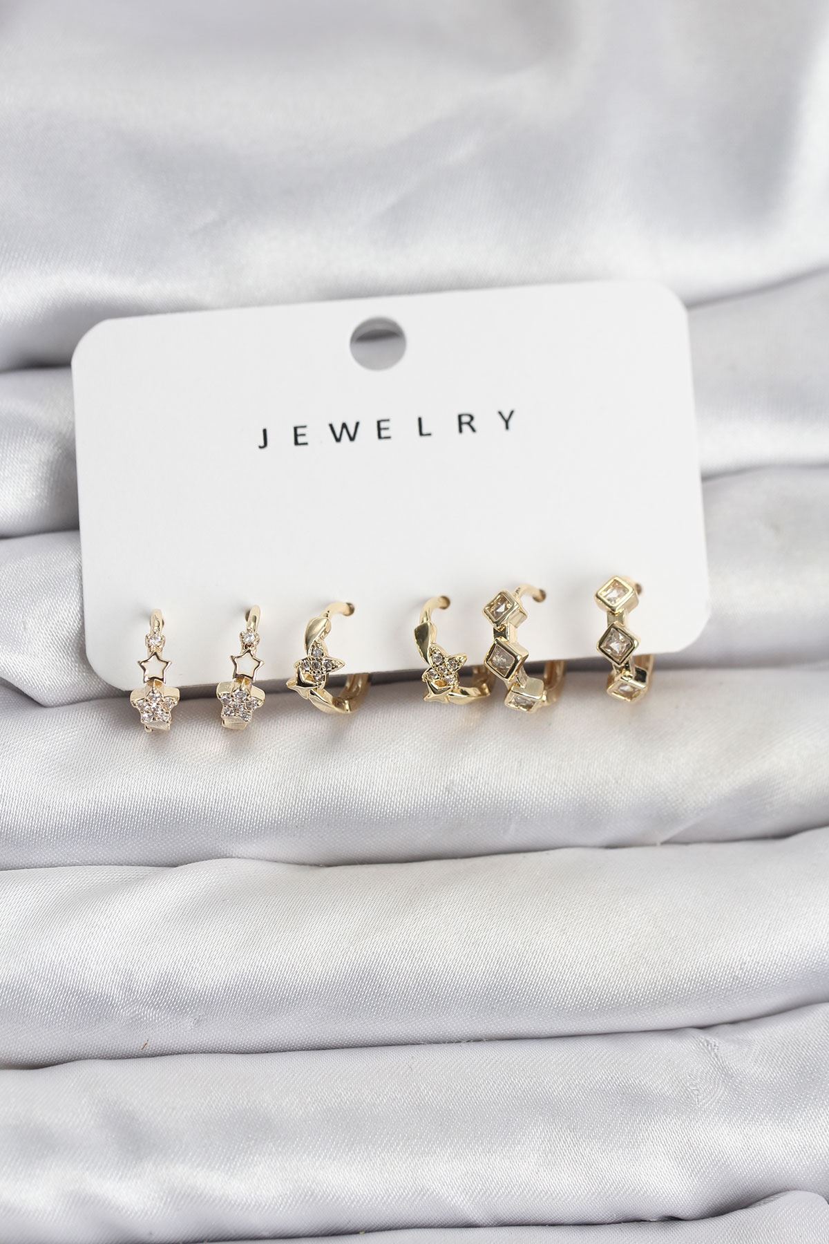 YRTCL Gold Renk Pirinç Yıldız Modelli Kadın Küpe Seti