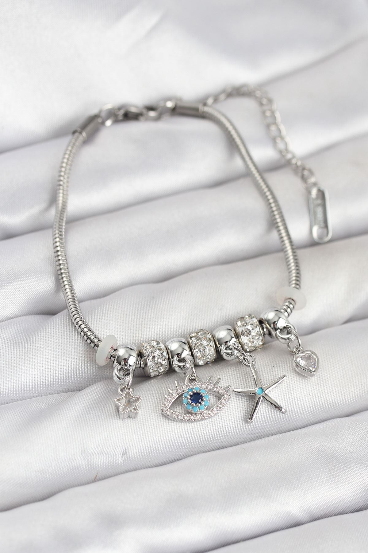 YRTCL Pirinç Gümüş Renk Göz Model Charmlı Kadın Bileklik