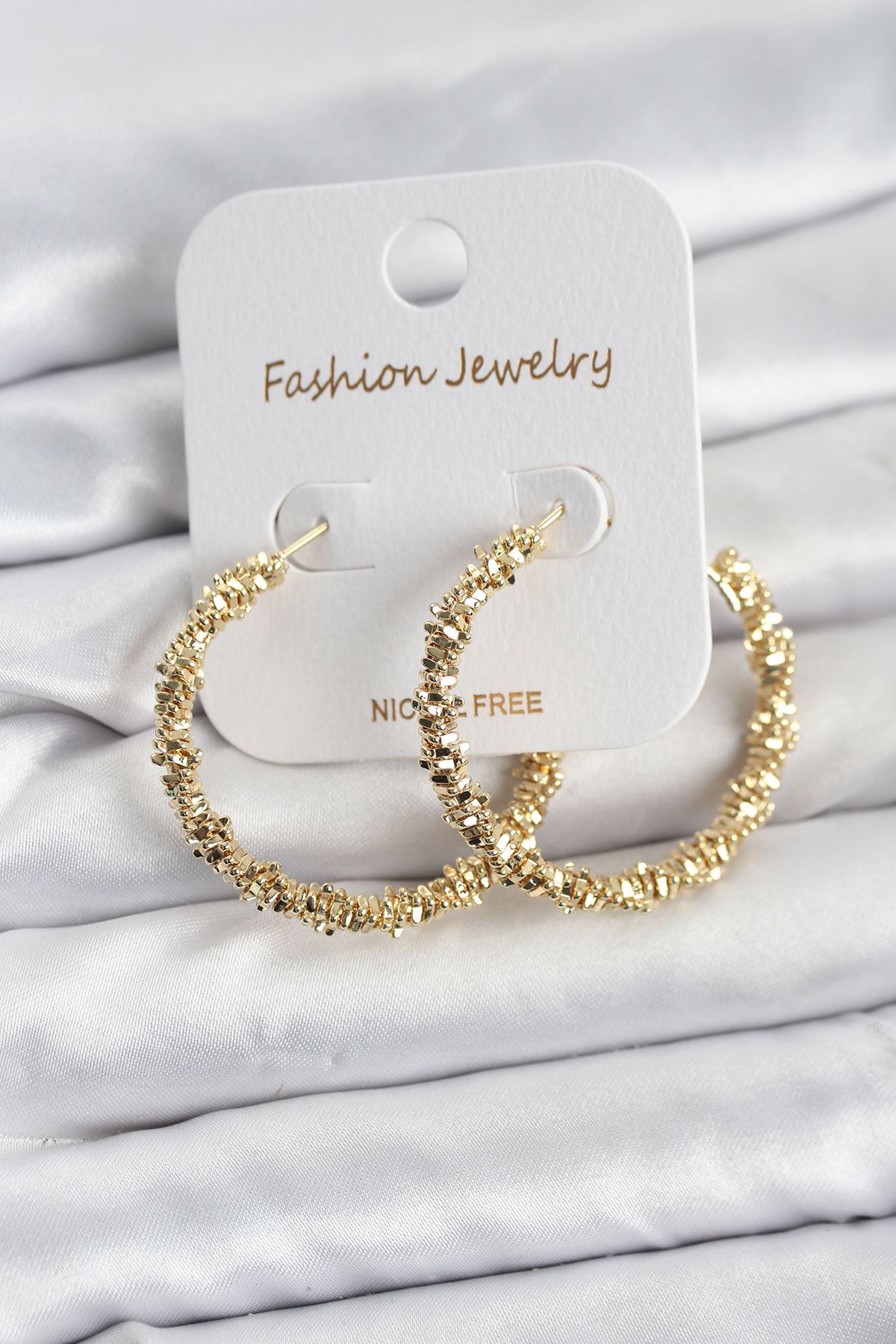 YRTCL Pirinç Gold Renk Tırtıklı Halka Model Kadın Küpe