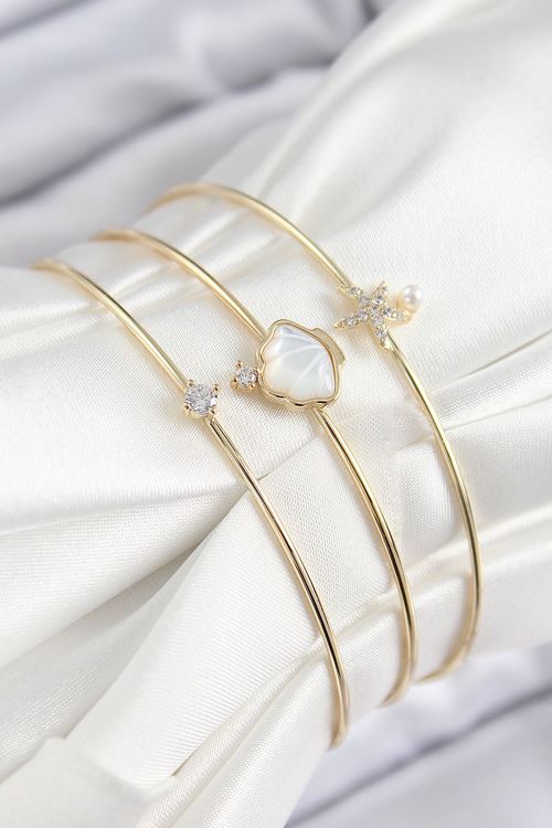 YRTCL Pirinç Zirkon Taşlı İstiridye Ve Deniz Yıldızı Model Gold Renk Vip 3'lü Kadın Bileklik